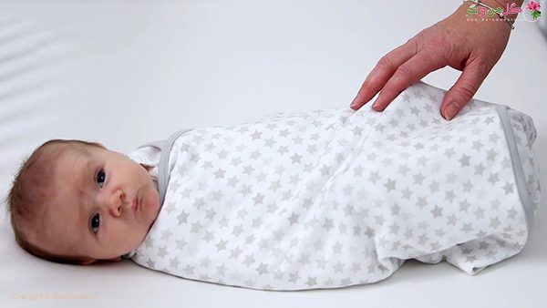 قنداق کردن نوزاد برای درمان کولیک